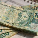 PIS/PASEP 2025: Guia Completo para Entender o Abono Salarial e Seus Pagamentos Dinheiro e calendário PIS/PASEP 2025